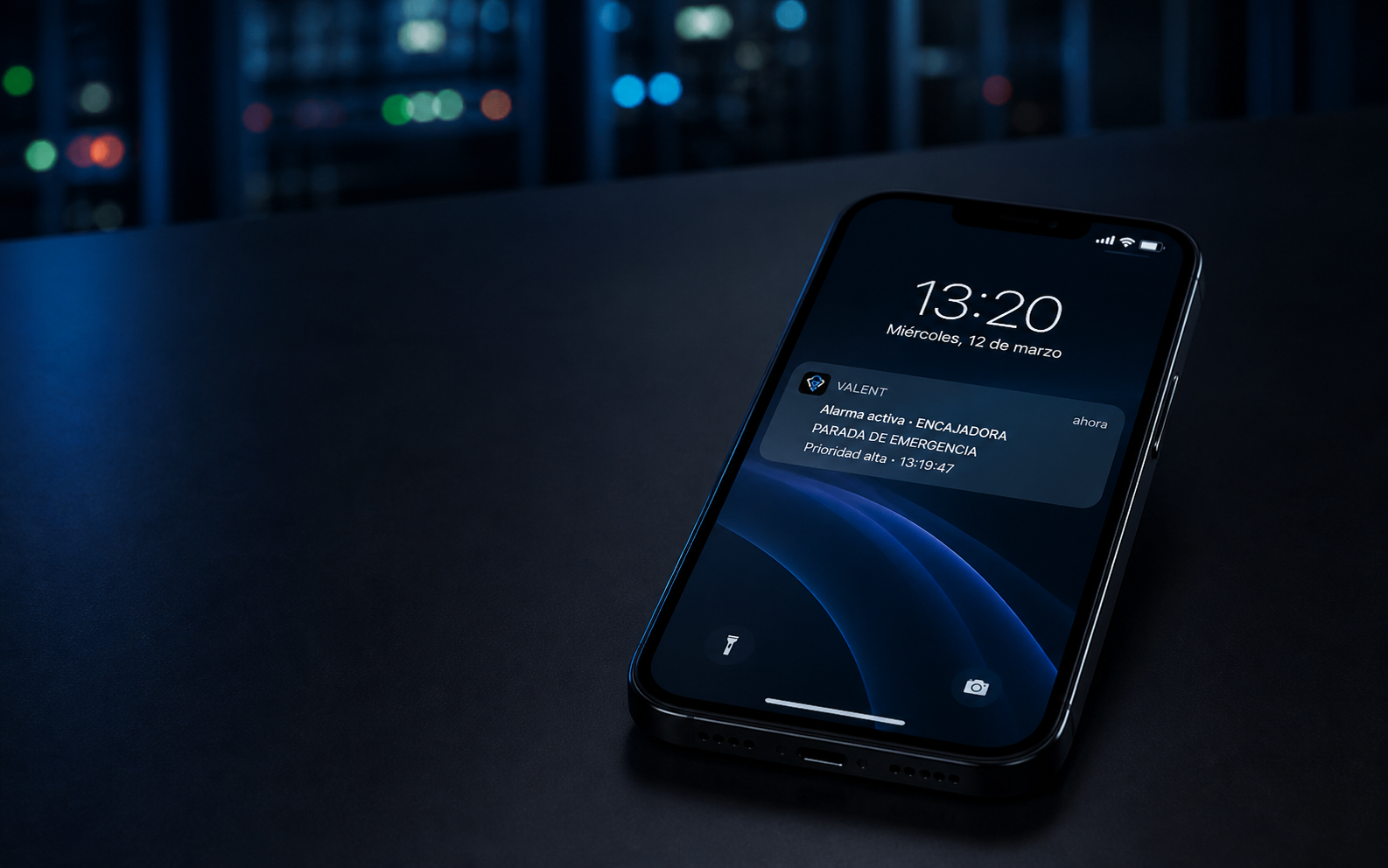 Smartphone mostrando una notificación realista de alarma VALENT